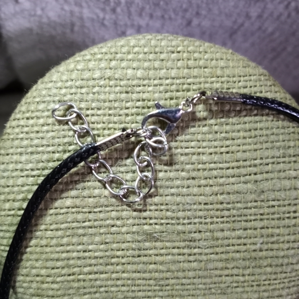 Goldtone be inspired round pendant on black cord necklace - Picture 3 of 4